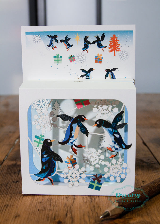 Penguins Christmas Card - award-winning luxury laser cut-out box design -made in England - dreamylondon